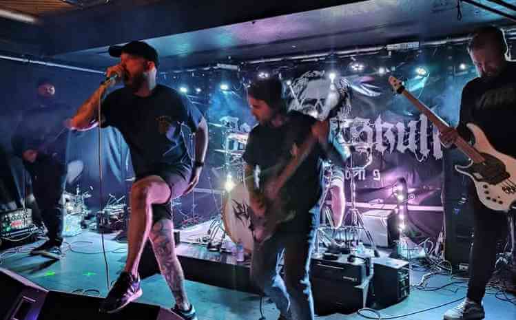 Photo of the band members of Suffer