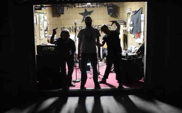 Photo of the band members of Heavy Merda